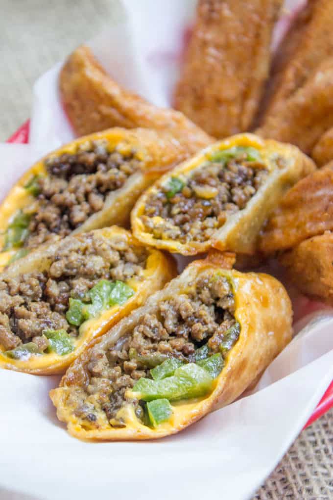 Cheesesteak egg rolls have all the flavors of the classic Philly Cheese Steak Sandwich in a crispy shell and made with ground beef! So easy to make and they taste...AMAZING.