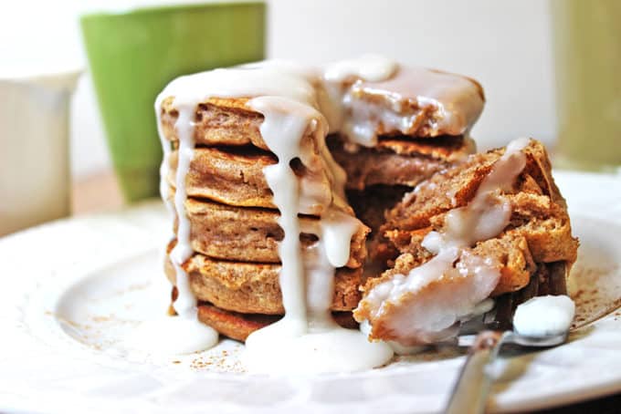 Fluffy, delicious pancakes that are easy to make and taste just like a cinnamon roll. With an icing similar to a cinnamon roll, you'll revel in the extra two hours of sleep you get when you're enjoying these with your morning cup of coffee!