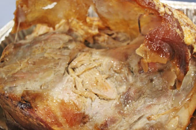 A foolproof EASY slow cooker and oven method for a shatteringly crisp Pork picnic shoulder that is pull apart tender on the inside with a thin crisp cracklin' skin layer.
