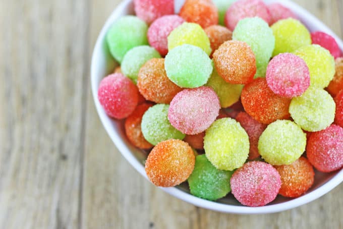 Sour Patch Grapes are my new go to for my sour candy fix! With only two ingredients, these candied grapes come together in seconds and taste like you threw deliciously tart green grapes into the machines at the Sour Patch Candy factory!