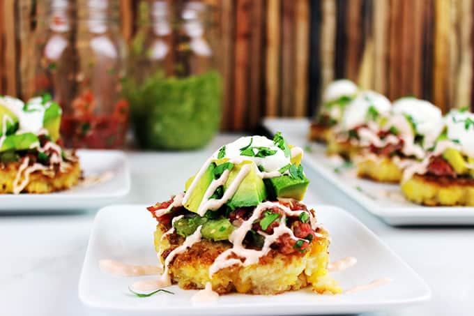 Cheesecake Factory Corn Cakes are tender, buttery corn cakes topped with tomatillo salsa, pico de gallo, southwestern sauce, avocados, cilantro and sour cream! A Cheesecake Factory favorite brought into your own kitchen.