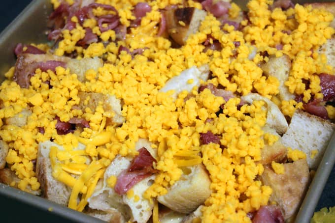 Layering egg casserole ingredients in casserole dish
