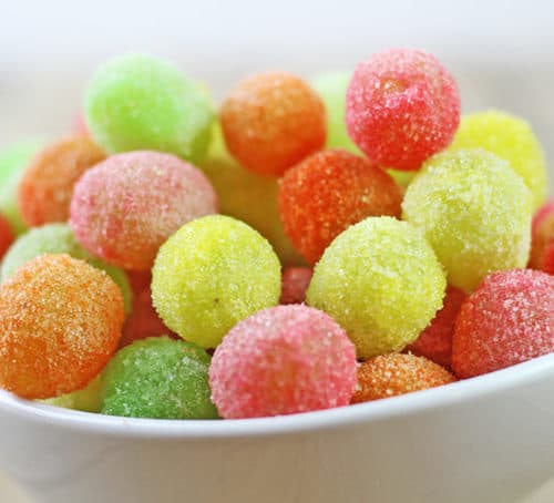 Sour Patch Grapes are my new go to for my sour candy fix! With only two ingredients, these candied grapes come together in seconds and taste like you threw deliciously tart green grapes into the machines at the Sour Patch Candy factory!