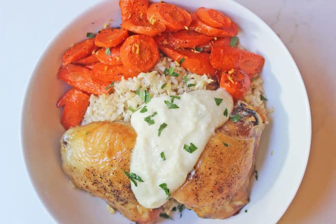 Zankou Chicken Copycat Bowl with their Chicken with Brown Rice Pilaf, Armenian Garlic Sauce & Lemon Scented Carrots. Serve with hot peppers and pickled turnips for a totally authentic experience.