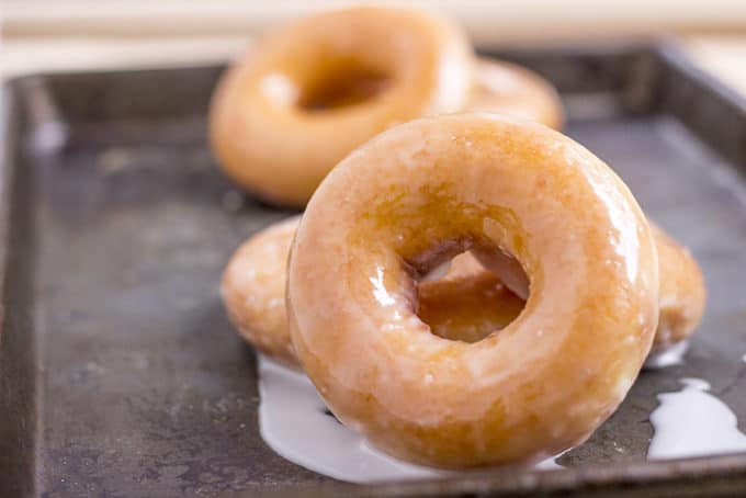 Krispy Kreme Glazed Doughnuts you know and love and now you can make them at home and eat them fresh without braving the lines or drive-thru.