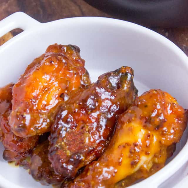 Tossed in a honey mustard and BBQ sauce, these chicken wings will be the hit of your game day party