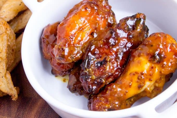 Tossed in a homemade honey mustard, these Honey Mustard BBQ Chicken Wings will be the hit of your game day party.