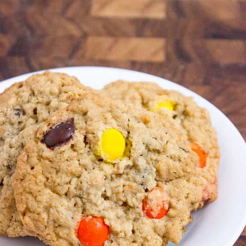 Chewy, crispy Oatmeal Reese's Peanut Butter Cookies are rich and moist dessert, a perfect addition to your lunchbox or even as a morning snack.