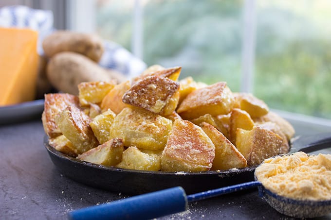 Cheddar and Sour Cream Roasted Potatoes have all the flavors of Cheddar and Sour Cream Potato Chips on freshly roasted potatoes! Made with 100% natural powdered cheddar and sour cream and totally craveable!
