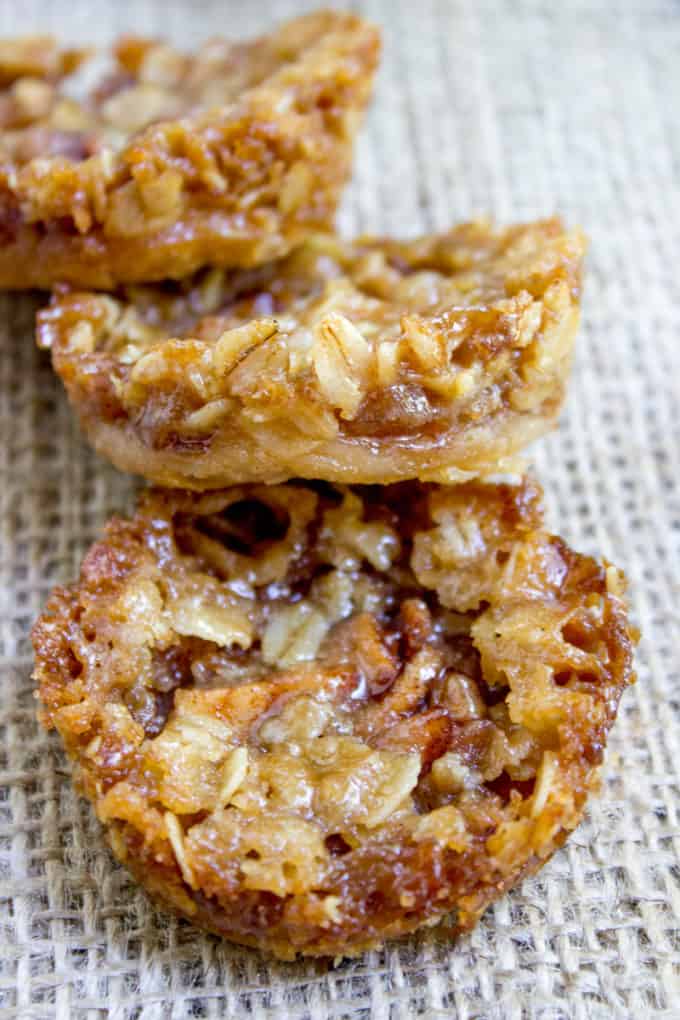 Apple Crisp Cookies with a pie crust bottom, sweetened spiced apples and a brown sugar and oat crust. All the fun of crisps and pies with just enough filling to make you feel like you're being healthy!