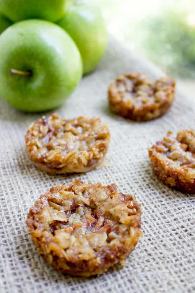 Apple Crisp Cookies with a pie crust bottom, sweetened spiced apples and a brown sugar and oat crust. All the fun of crisps and pies with just enough filling to make you feel like you're being healthy!
