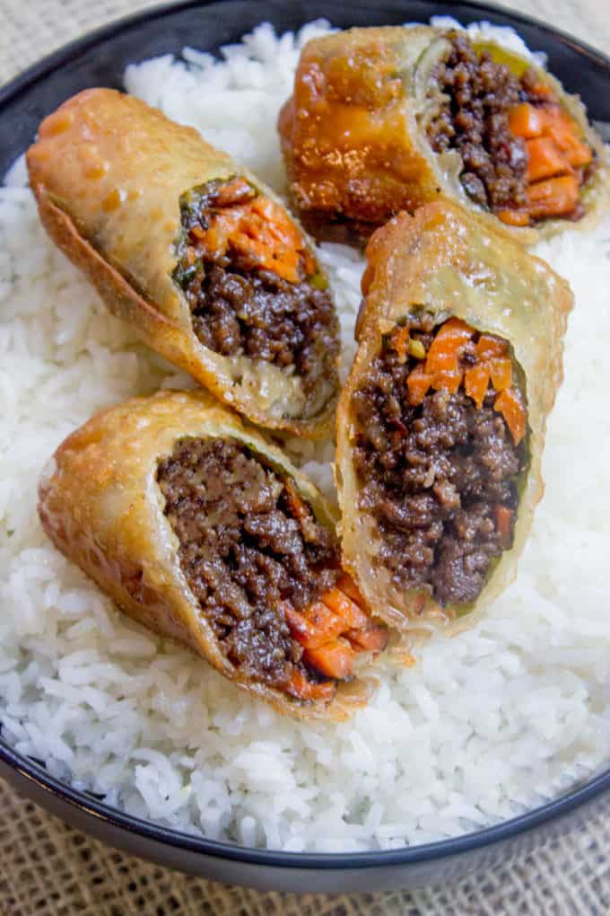 Korean Ground Beef Egg Rolls with carrots and served over rice