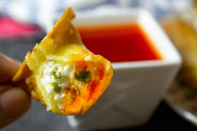 fried wonton dipped in homemade sweet and sour sauce