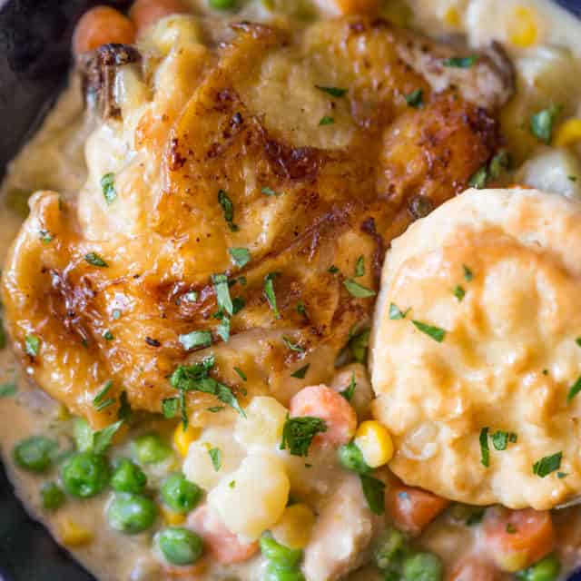 Slow Cooker Crispy Chicken Pot Pie with crispy chicken thighs and all your favorite pot pie vegetables cooked together to make a thick and creamy side dish to the chicken.