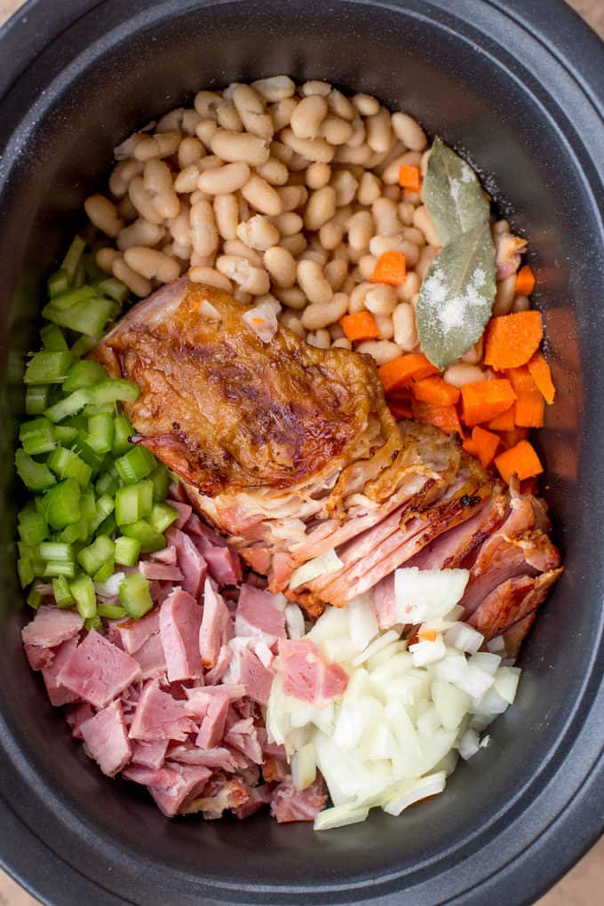 Slow Cooker Ham and Bean Soup is the perfect recipe after your holiday ham when you want a cozy warm soup to help you recover from holiday cooking!