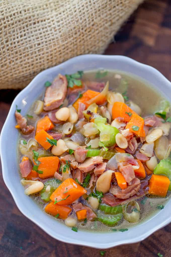 Ham and Bean Soup (Crock Pot) is the perfect recipe to make after you've enjoyed your holiday ham and want a cozy warm soup to help you recover from all the holiday cooking you just survived!