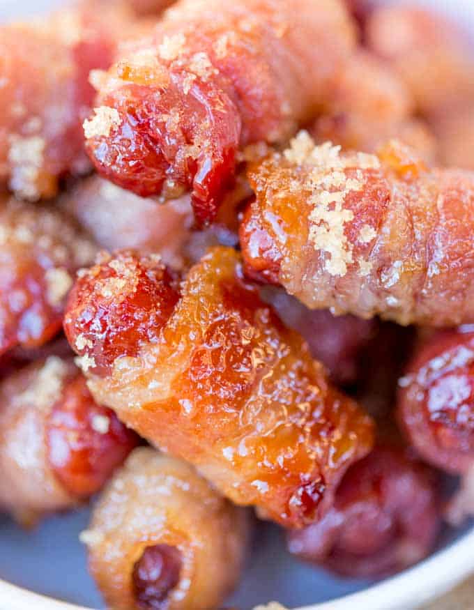 Bacon Brown Sugar Smokies are the quintessential party food that everyone fights over even though they're so easy to make! Just three ingredients plus I have five flavor add-in options for you!
