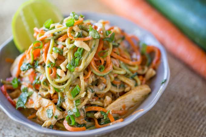 Healthy Thai Peanut Chicken Zucchini Noodles with a fresh peanut lime sauce mixed with veggie noodles makes a perfect light meal and lunch the next day!