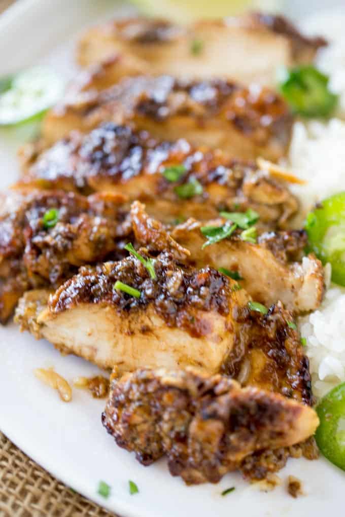 Easy Grilled Jerk Chicken made with a marinade that takes just a few seconds to make is the most flavorful authentic Jamaican chicken you'll grill all summer!