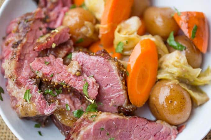 Slow Cooker Corned Beef Dinner all made in one pot with cabbage, potatoes and carrots for the perfect easy St. Patrick's Day dinner you can just set and forget.