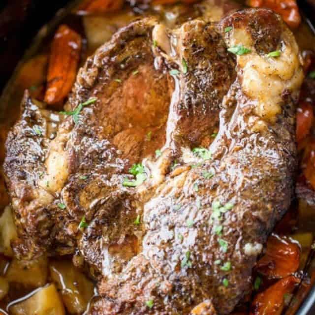 Ultimate Slow Cooker Pot Roast that leaves you with tender meat, vegetables and a built in gravy to enjoy them all with in just 15 minutes of prep! Perfect weeknight dinner!