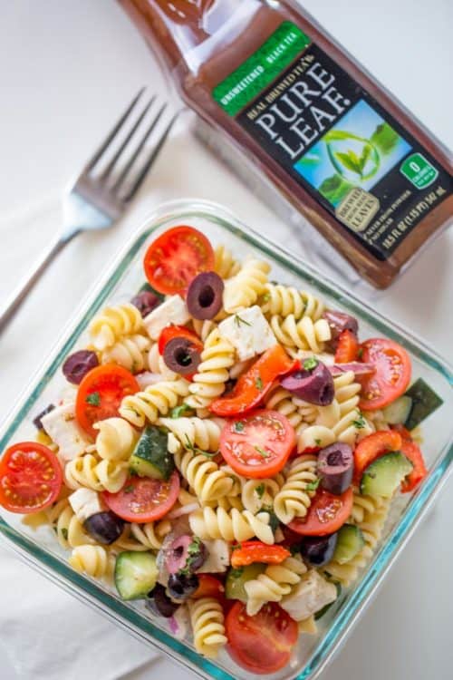 Easy Greek Pasta Salad with a homemade vinaigrette, pasta, feta, and olives is the perfect, easy lunch meal you can enjoy at room temperature. Also great with added chicken or shrimp.
