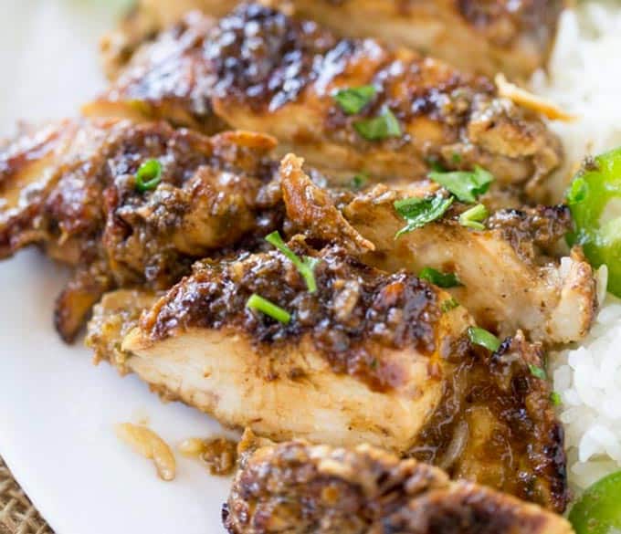 Easy Grilled Jerk Chicken made with a marinade that takes just a few seconds to make is the most flavorful authentic Jamaican chicken you'll grill all summer!