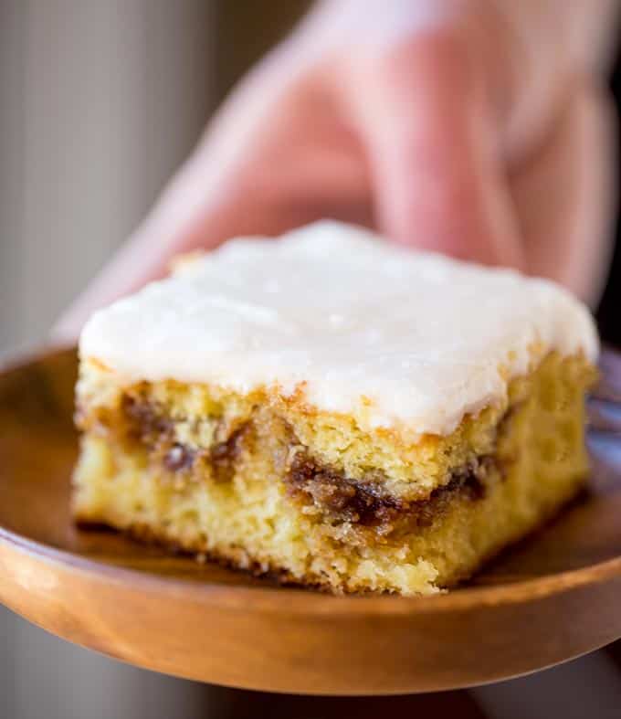 Honey Bun Cake with no cake mix, tastes like the classic honey buns you loved as a kid and like your favorite yellow cake growing up. Perfect for brunch and holiday parties.