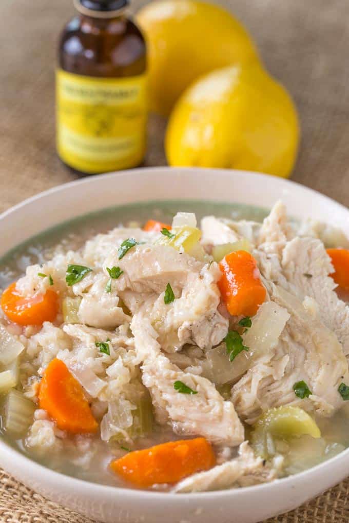 Slow Cooker Chicken and Rice Soup with brown rice and chicken breasts, this soup is comforting and warm with no extra added fat and with the use of lemon extract it can be made from pantry ingredients any time of year.