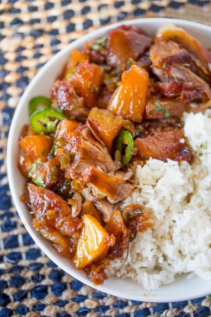 Slow Cooker Jalapeno Pineapple Pork with just six ingredients is crispy with a sweet, sticky, spicy glaze and meltingly soft pineapple chunks.