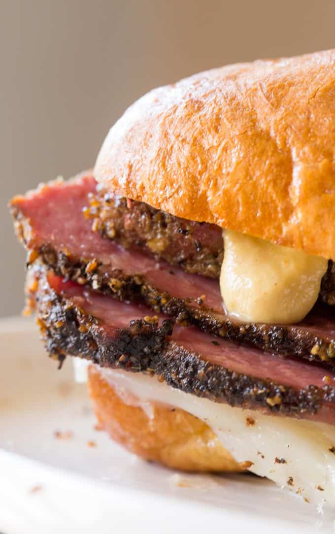 Slow Cooker Pastrami Sandwiches are easy to make for a crowd or for your lunches and takes just a few ingredients. You'll never buy deli pastrami again!