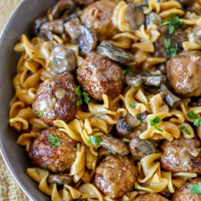 Quick and EASY Meatball Stroganoff in just 30 minutes with a creamy sour cream mushroom gravy, egg noodles and meatballs, it's the perfect weeknight meal!