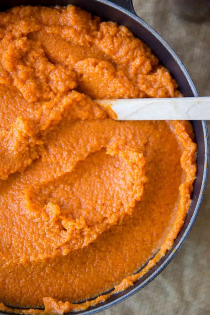 Homemade Pumpkin Puree is an easy way to use up all your Halloween pumpkins and it tastes so much better than canned pumpkin.