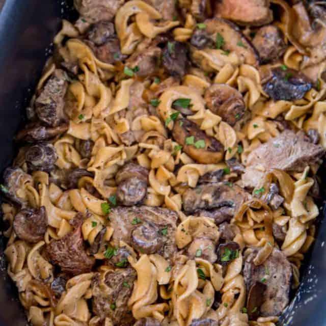 crockpot stroganoff with tender beef chunks and egg noodles