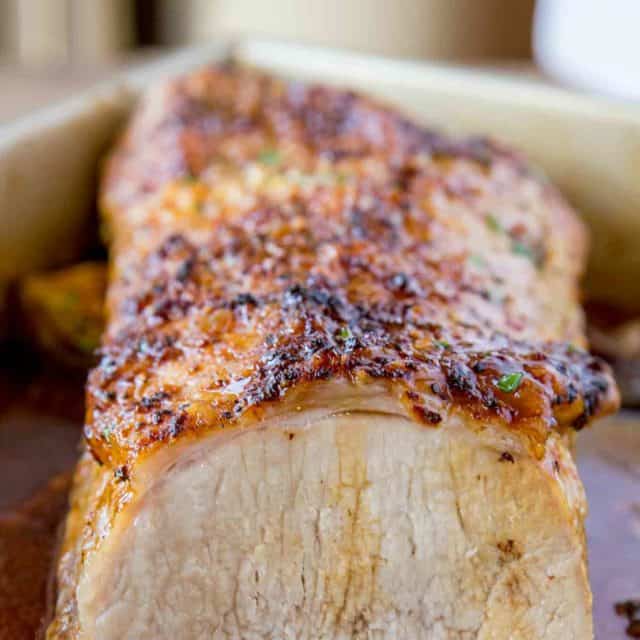 Ultimate Garlic Pork Loin Roast made with just five ingredients, it is easy enough for a weeknight meal and fancy enough for your holiday dinner parties!