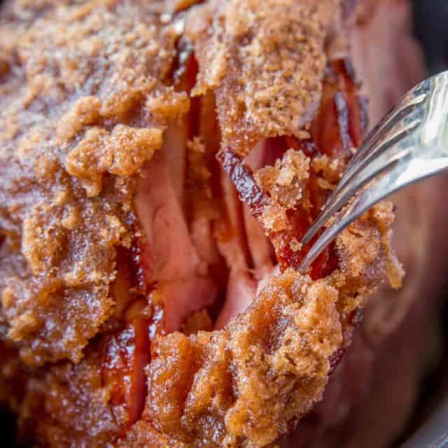 HoneyBaked Ham (Copycat) made with honey, sugar and delicious spices is crispy, sweet, smoky and delicious like your favorite ham without the price tag!