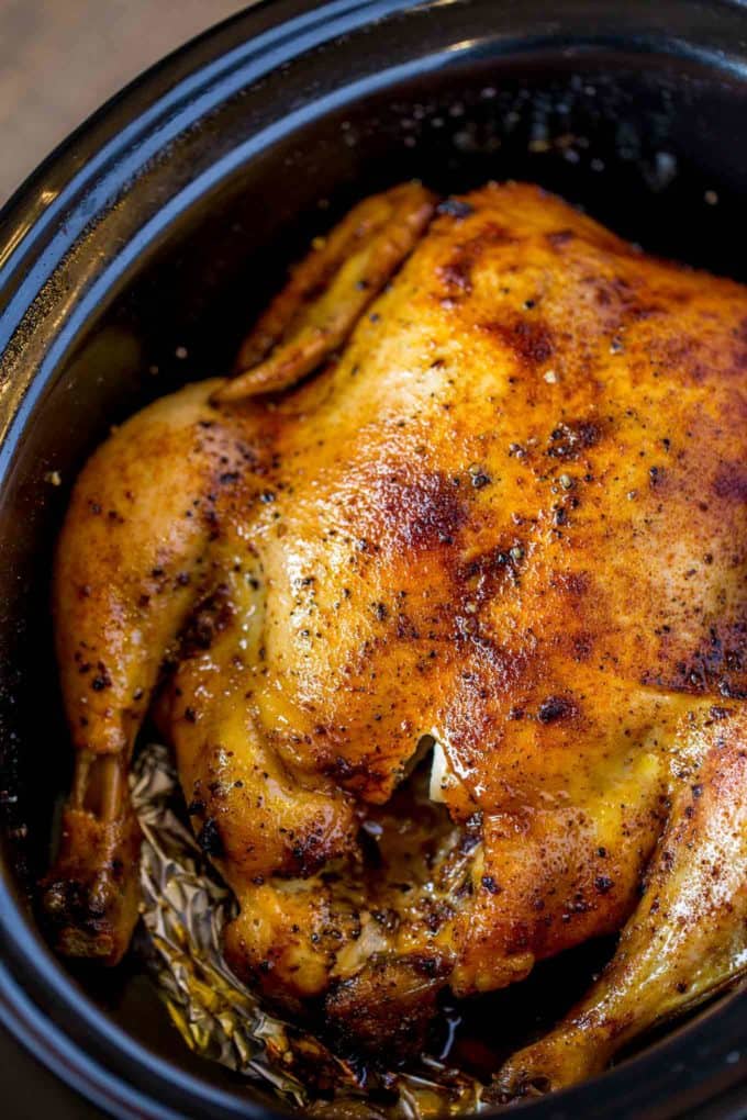 Quick and easy rotisserie chicken made entirely in the slow cooker.