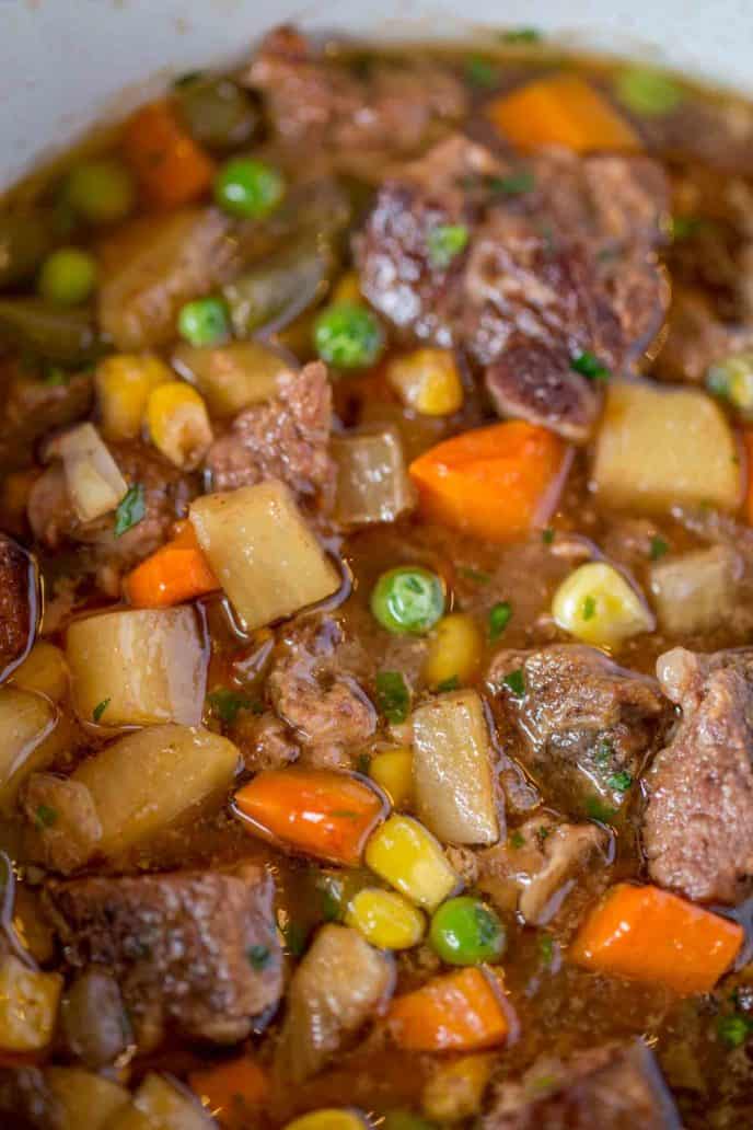 You'll want to dip crusty french bread in this AMAZING Slow Cooker Vegetable Beef Soup!