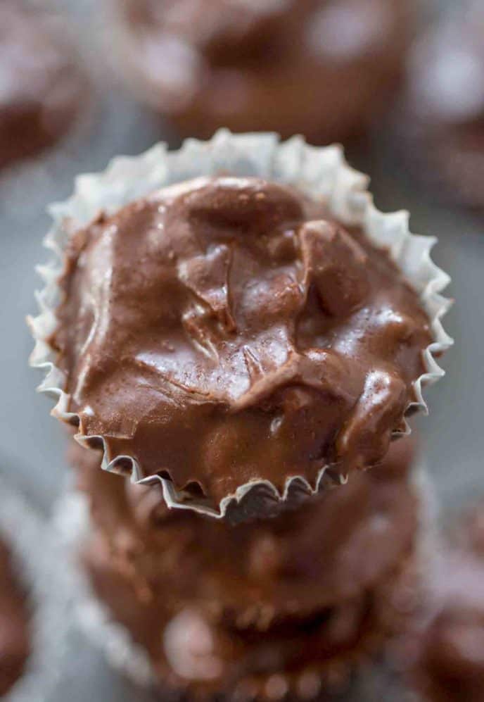 Slow Cooker Chocolate Peanut Candy made with just four ingredients is a perfectly easy holiday recipe that will make gifting even easier!