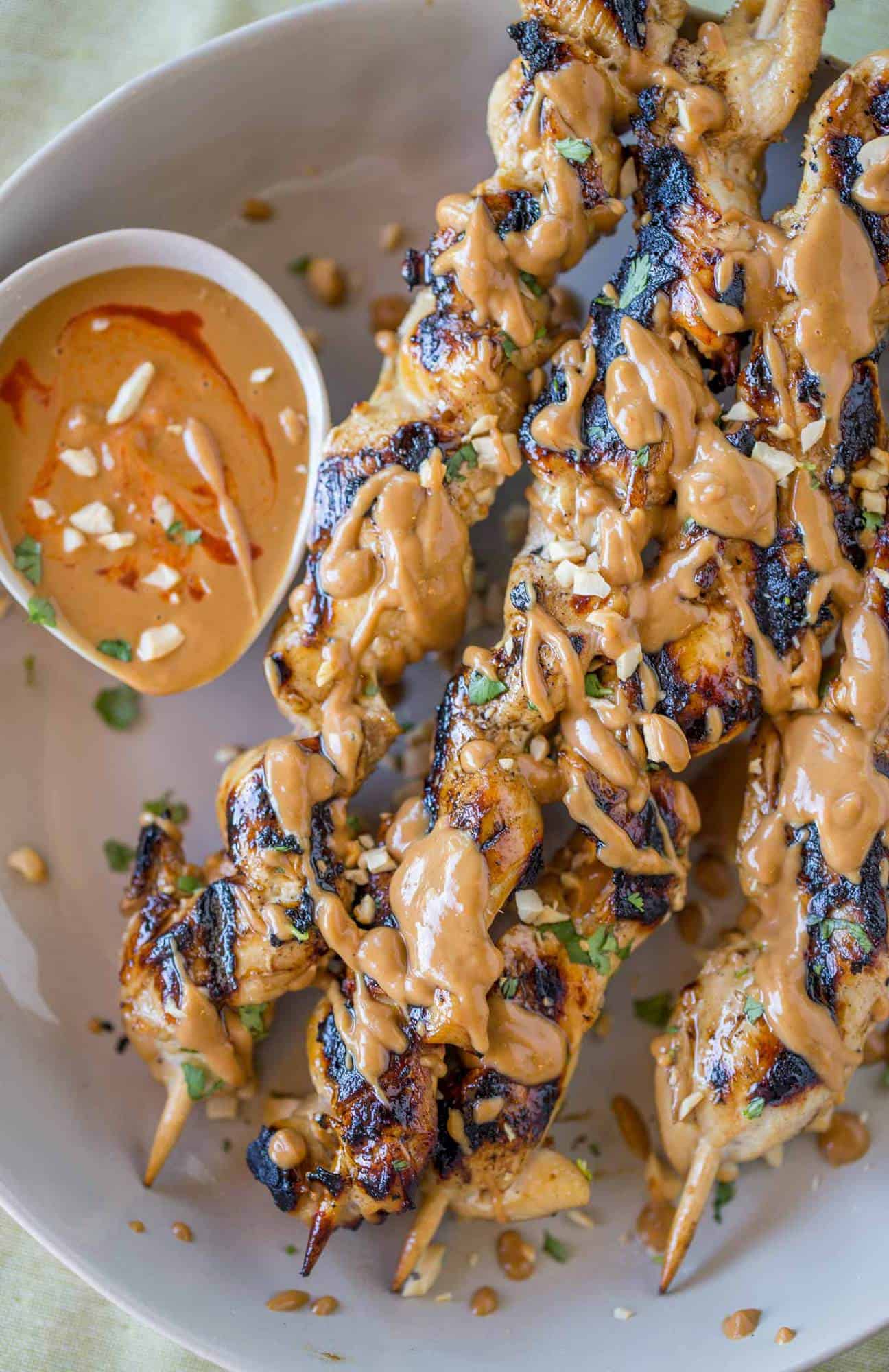 Chicken Satay skewers with the easiest peanut sauce is both authentic and approachable for kids too! So delicious you'll skip the Thai food delivery!