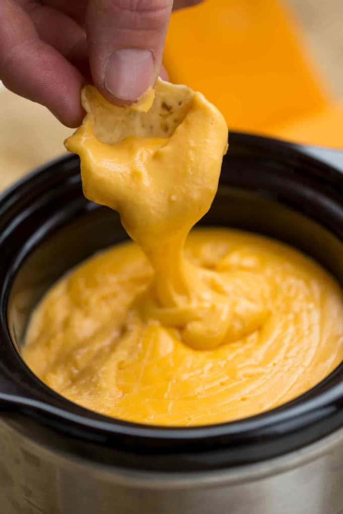 The easiest slow cooker nacho cheese sauce ever! AND no processed cheese or velveeta!