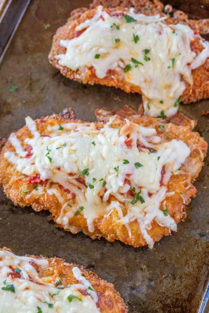 Chicken Parmesan on cookie sheet.