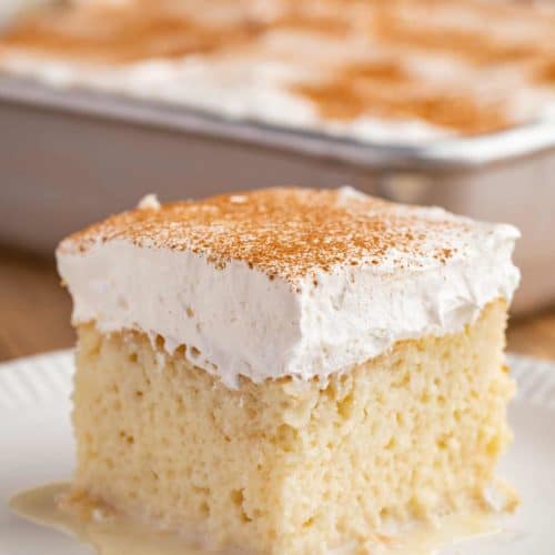 Slice of Tres Leches Cake on plate