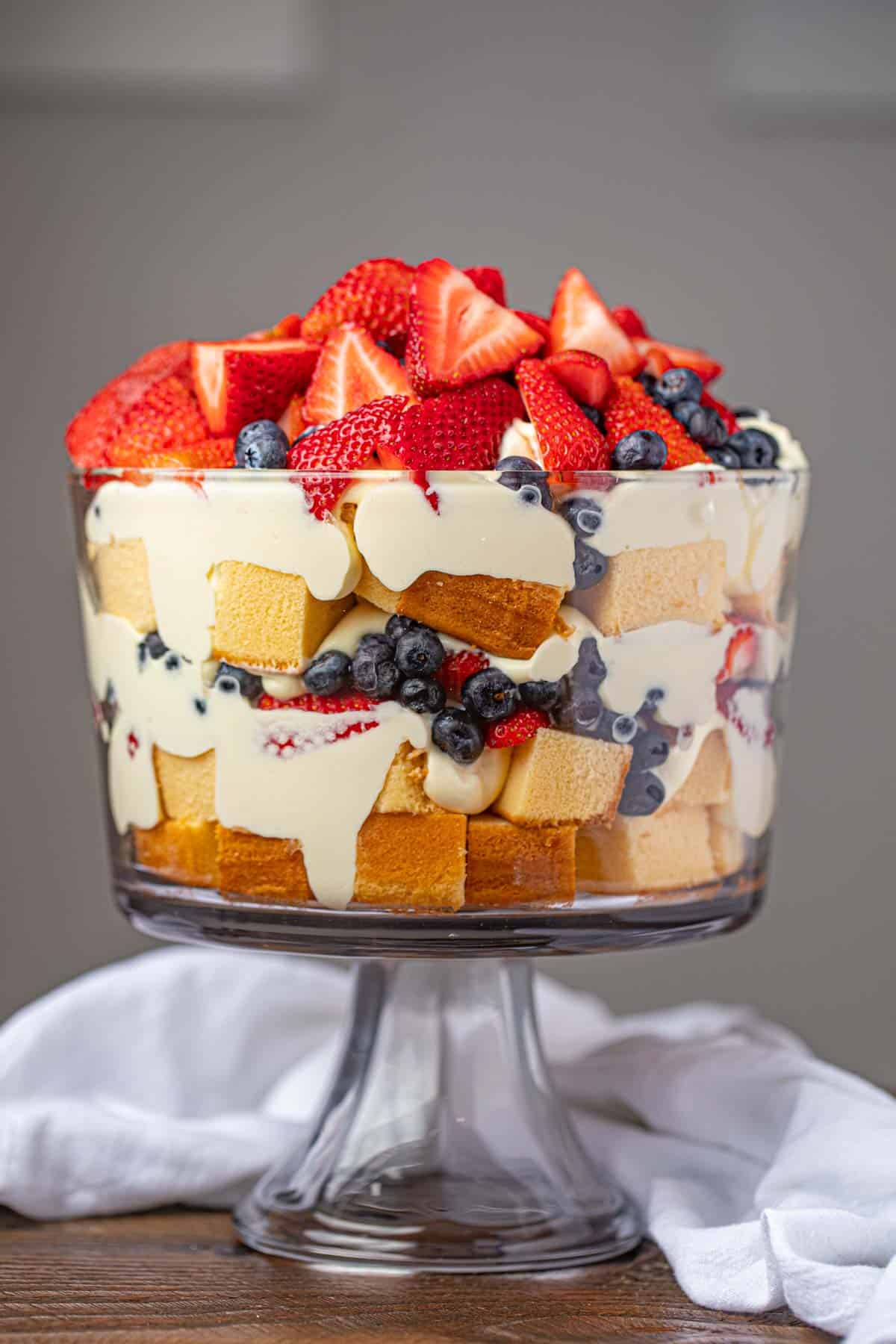 Classic Trifle with strawberries and blueberries in large trifle dish