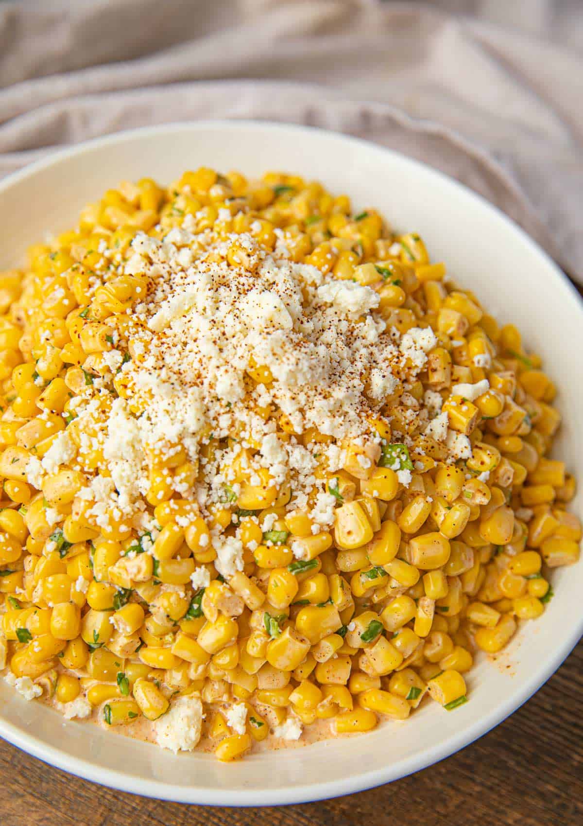 Mexican Corn Salad with Cotija Cheese sprinkled on top