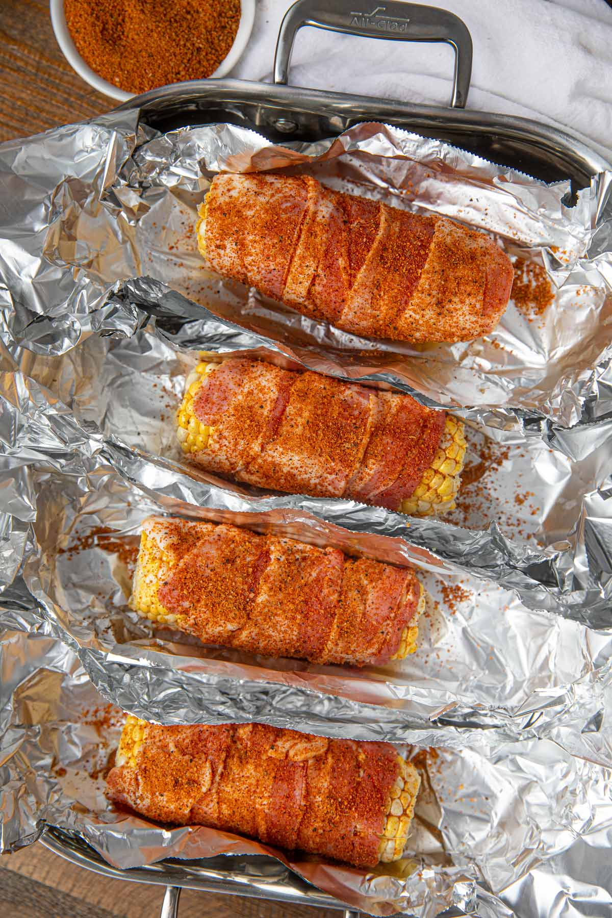 BBQ Oven Roasted Corn with Bacon in pan with foil