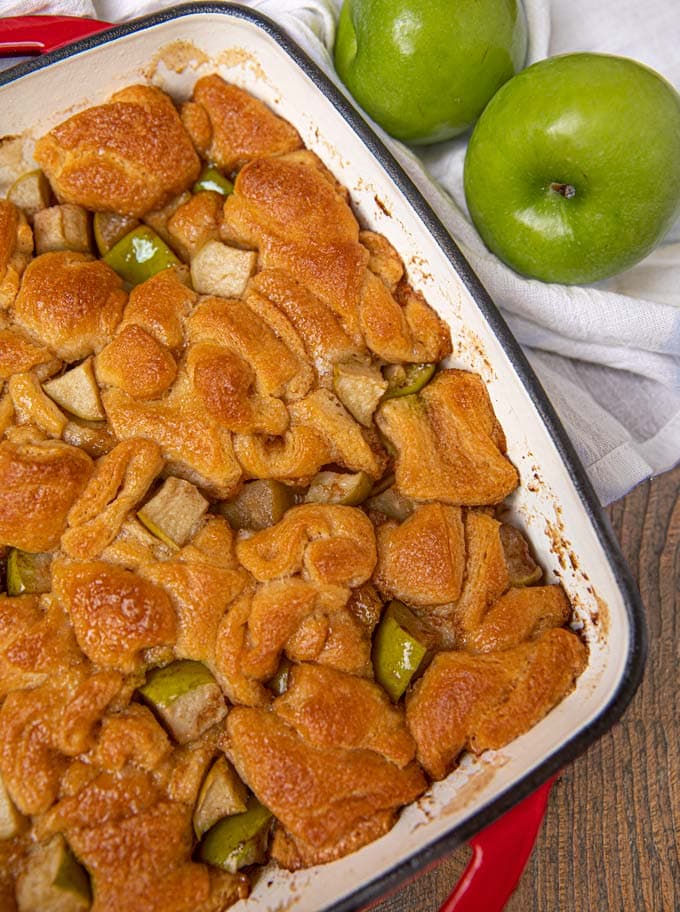 Apple fritter casserole in a red pan