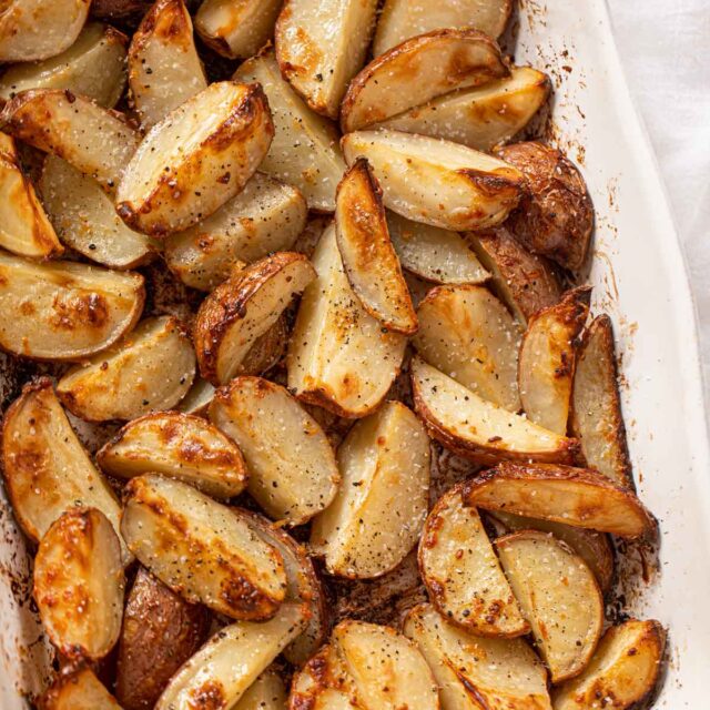 Roasted Red Potatoes in white baking dish