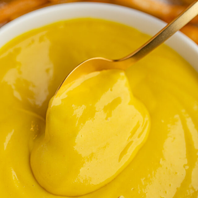 Honey Mustard in bowl with gold spoon