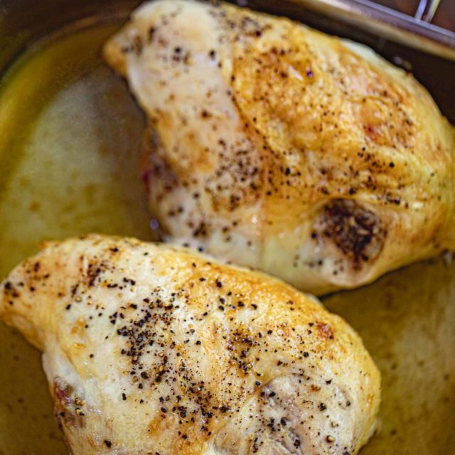 Baked Chicken Breasts with rib bones and skin